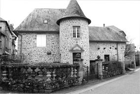 french stone house with turret, black and white