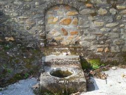 medieval fountain on the street