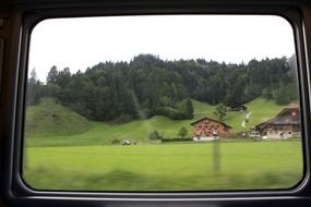 Alpine mountains through the window