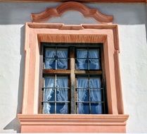 window on old facade