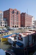 their red brick houses on the waterfront with boats