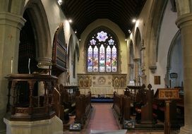 church with stained glass windows in the hall