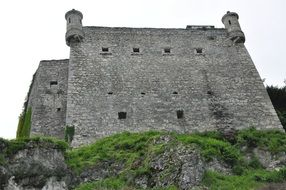 View from below on the stone walls of medieval castle, Poland