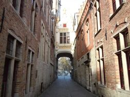 arch on the street among the houses