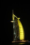 Modern building in Dubai at night