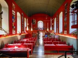 red interior of restaurant, Germany, Munden