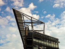 Roof of a modern building against a sky with clouds, dusseldorf