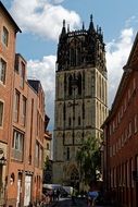 a church with a bell tower in Munster