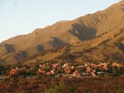 panoramic view of a village at the foot of a hill in argentina