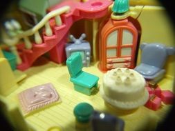 Miniature doll house made of plastic