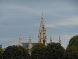 church towers over the trees