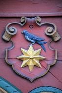 the emblem of the bird on star