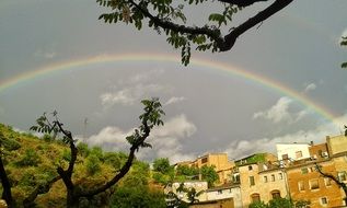 rainbow over the city after the rain