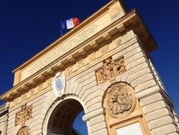 triumphal arch at sky, france, montpellier
