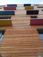 Wooden facade with color inserts