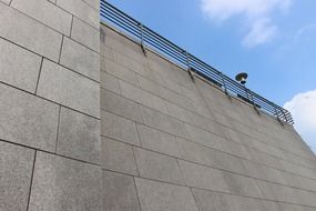 Sheer stone wall