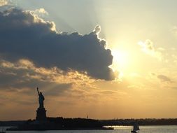 statue of liberty on a background of evening sky