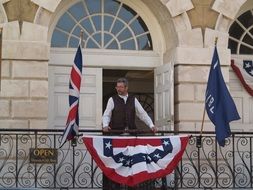 balcony with flags