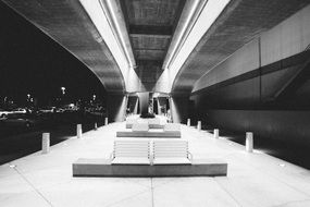 black and white photo bench on the platform