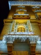 Christmas lights on the facade of a building in Budapest