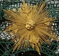 monument to the Golden sun with a face