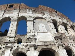 memorial board with cross on wall colosseum, Italy, Rome