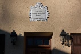 lights on the facade at the entrance to the house