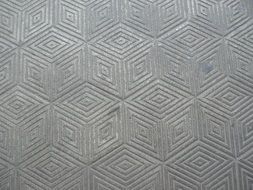 geometric pattern on the tile in the city