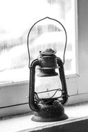 kerosene lantern on the window