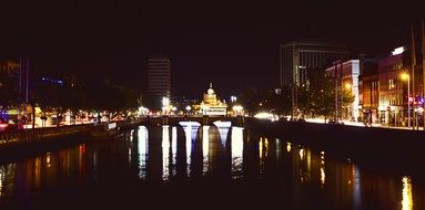 bridge surrounded by night city