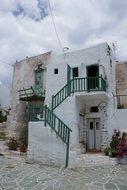 old house with external staircase, greece