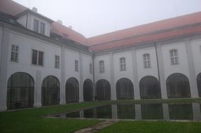 monastery courtyard in the fog