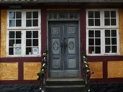 old house with white lattice windows