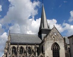 part of facade of Basilica of Notre-Dame de Liesse at sky, france