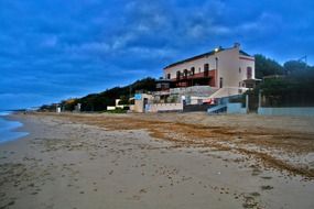 house on the sandy coast of Italy
