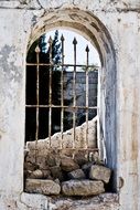 old grated window