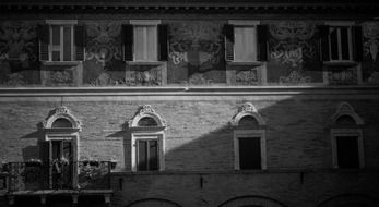 black and white photo of an old house in Italy