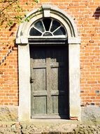 Wooden door of the old building