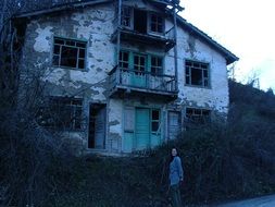 ruined house among the trees