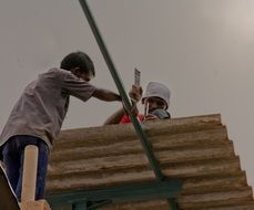 workers at the counter in India