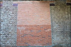 grey and red brick wall