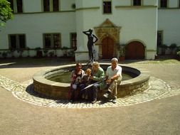 family near the fountain at Dornburg Castle