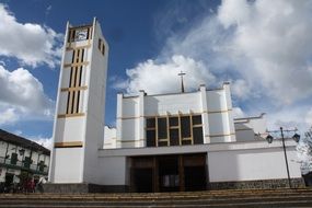 beautiful white religion temple under blue sky with white clouds