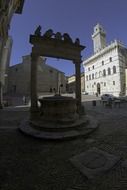 landscape of well on the town hall square in Montepulciano
