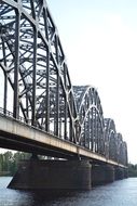 bridge over the river with arched railing