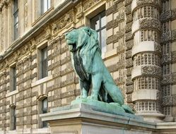 statue of a lion near the Louvre