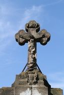 stone cross on the old church in Gelsdorf