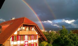 double rainbow over the house