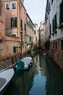 landscape of parked boats on the canal in Venice