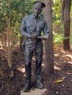 statue of a policeman in the woods in Dallas, Texas